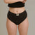 DAME Period Pant - High Waist Comfort in black, designed for heavy flow with absorbent organic cotton. Leak-proof fit for all-day freshness.