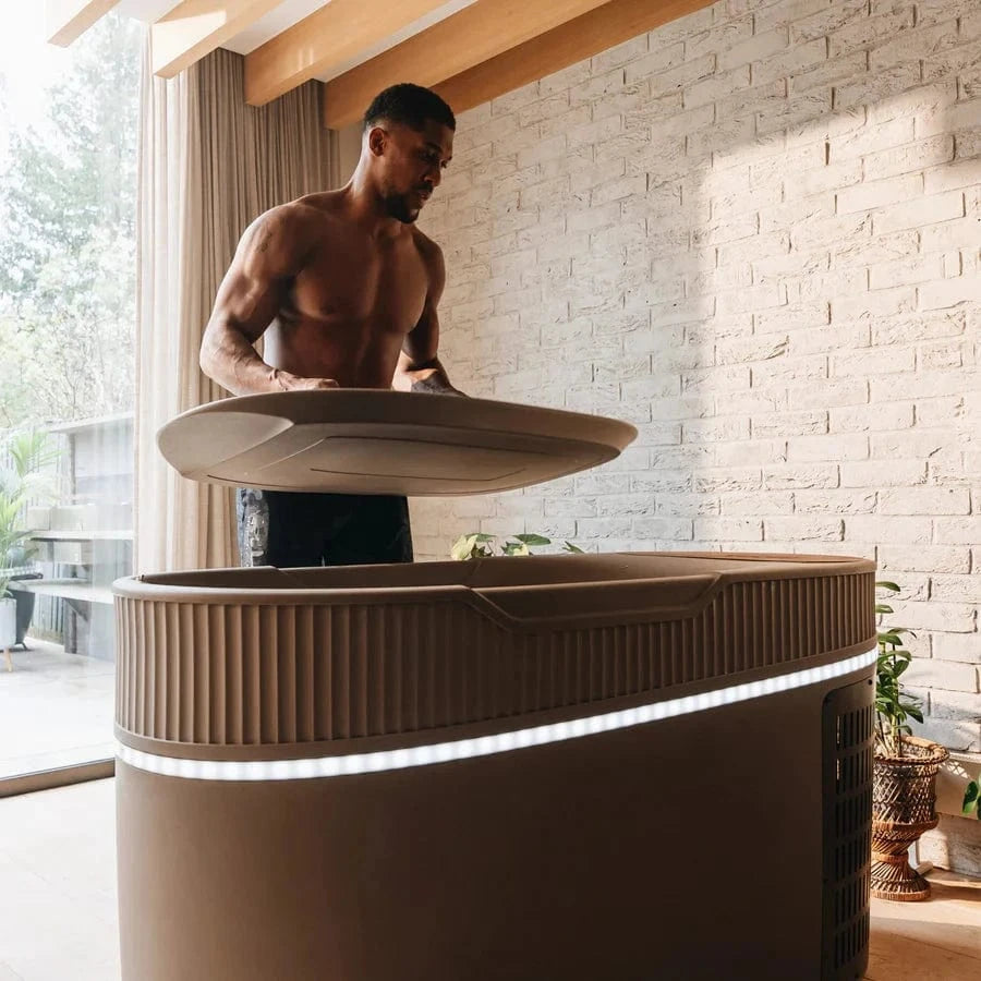 Monk Smart Ice Bath - Smart Ice Bath System | Cold Therapy Tech in modern home gym setting with athlete preparing for cold therapy session.
