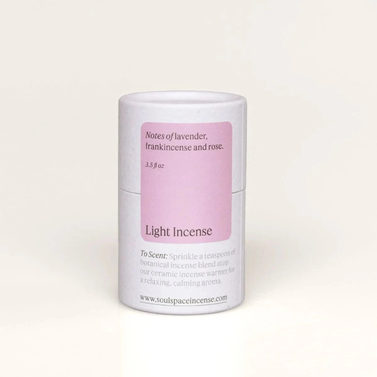 Light Incense Frankincense & Rose botanical incense blend in a white and pink cylindrical container with dried floral mix for calming home fragrance.