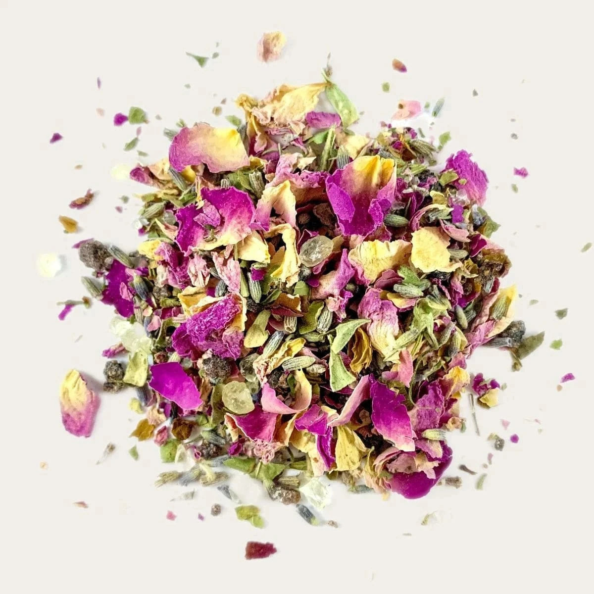 Light Incense Frankincense & Rose botanical incense blend in a white and pink cylindrical container with dried floral mix for calming home fragrance.