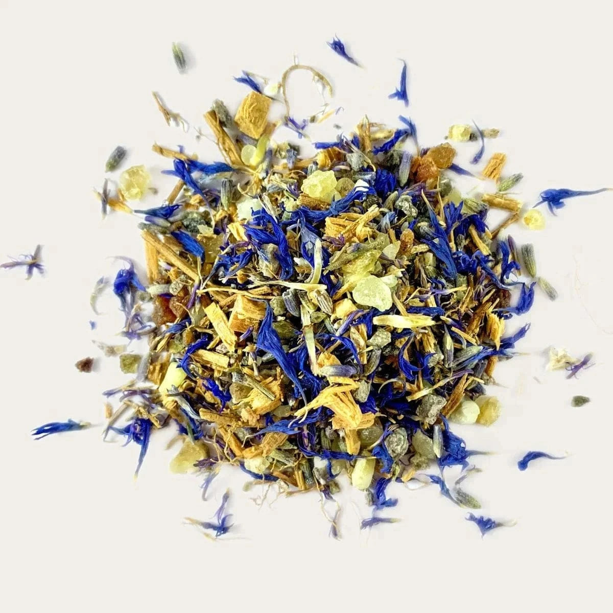 Wonder Incense - Frankincense Myrrh Luxury blend in a white cylindrical container with notes of sandalwood and copal, ideal for spiritual serenity.