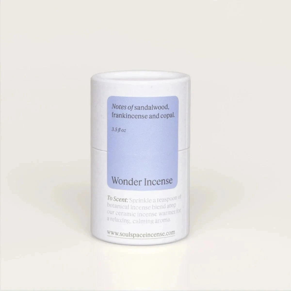 Wonder Incense - Frankincense Myrrh Luxury blend in a white cylindrical container with notes of sandalwood and copal, ideal for spiritual serenity.
